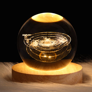 Starlux™ galaxy-themed crystal ball LED lamp on wooden base 