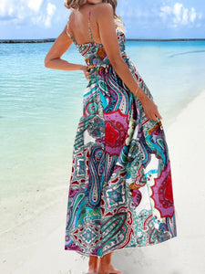 Woman wearing printed smocked maxi cami dress outdoors – Iconiqu Amsterdam